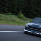 Illustration for article titled True Hero Swapped A Volvo Amazon Wagon Body Onto A BMW E30 In His Driveway